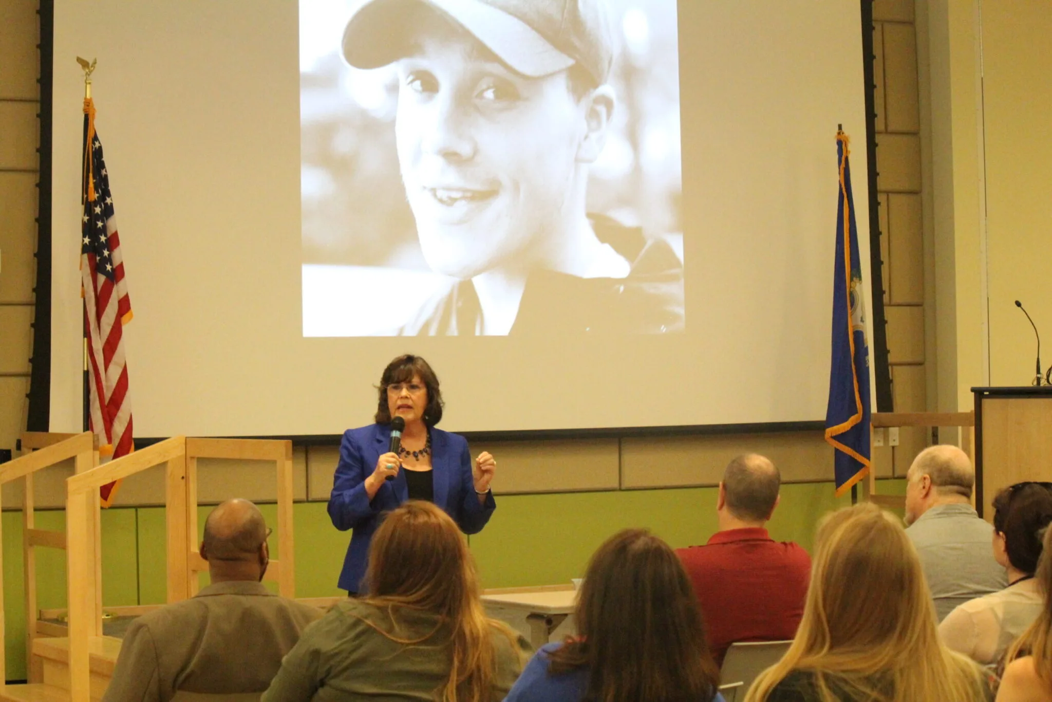 Ginger Katz delivering a live Courage to Speak® presentation for parents and community members
