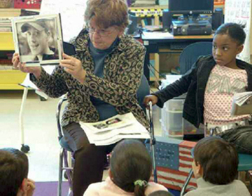 Teacher with classroom